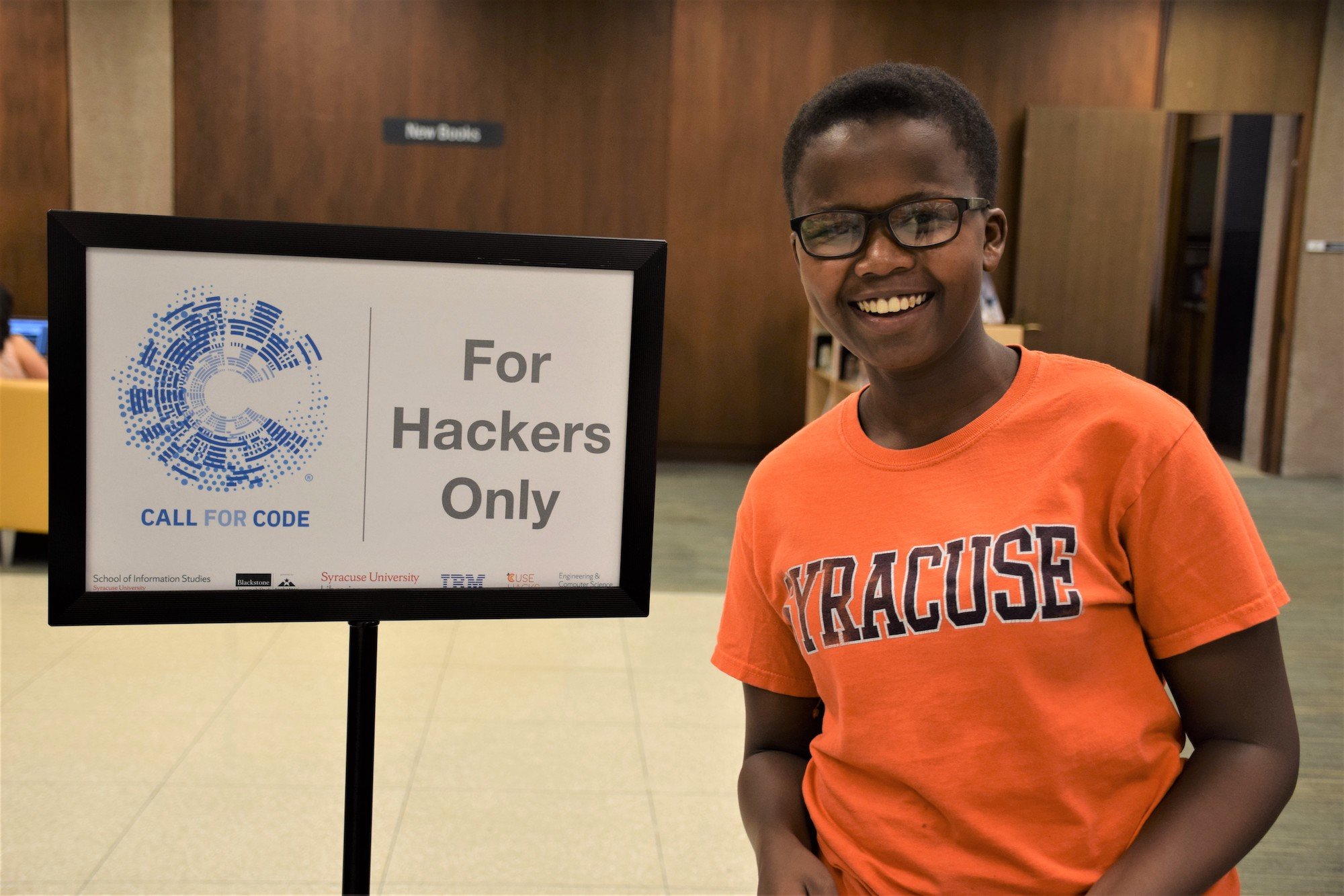 A student at a hackathon