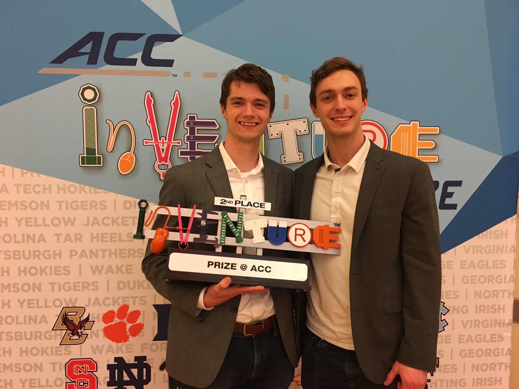 Quinn King and Alec Gillinder with ACC award