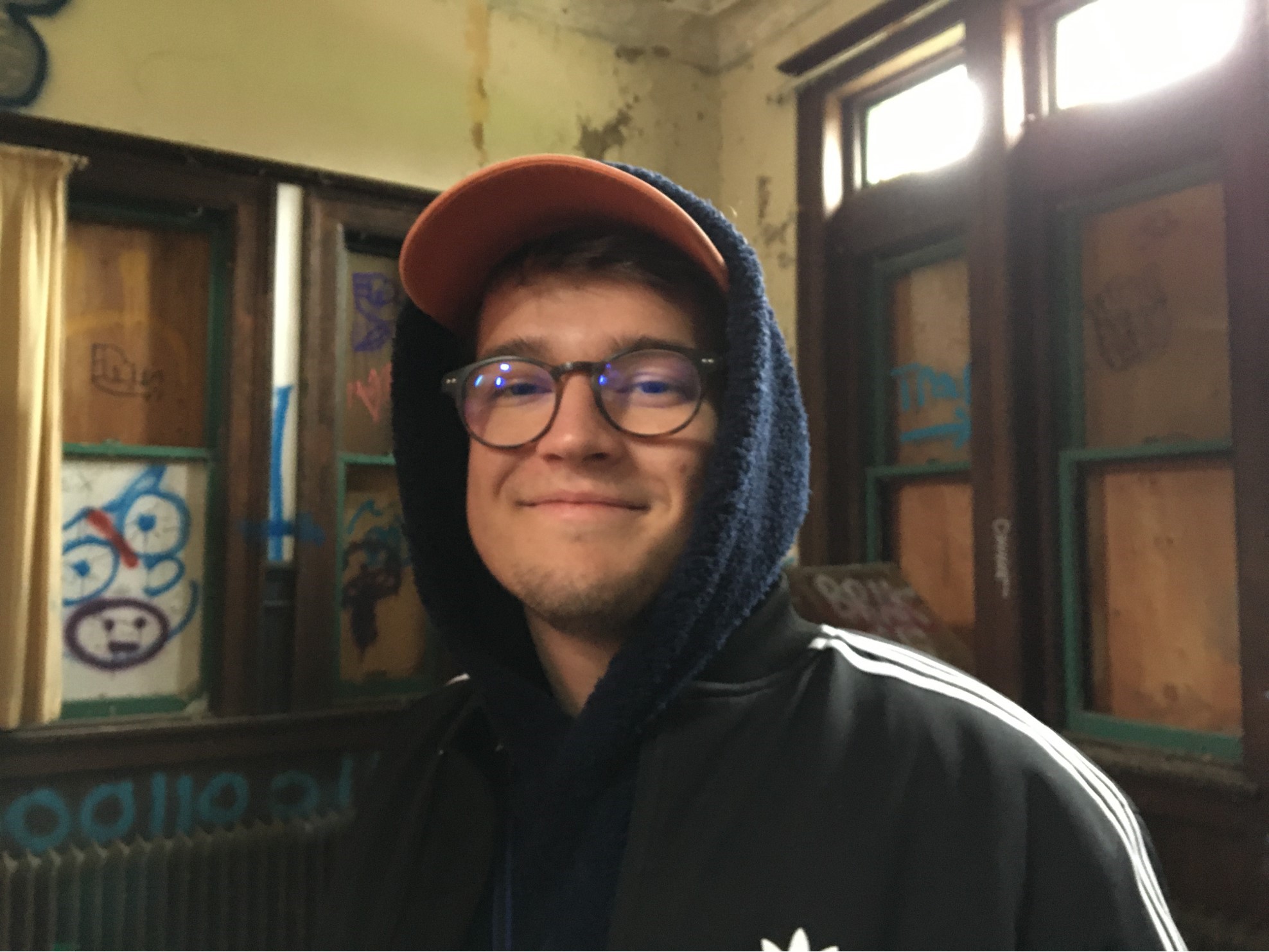 young man in a hooded sweatshirt