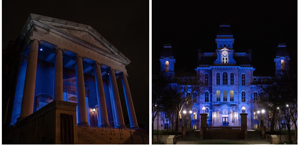 Hendricks Chapel and Hall of Languages at night, with blue lighting