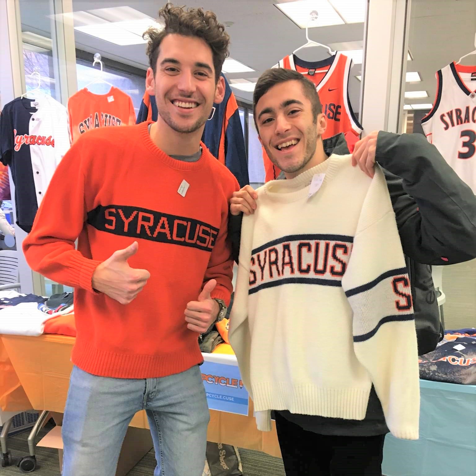 two students with Syracuse sweaters